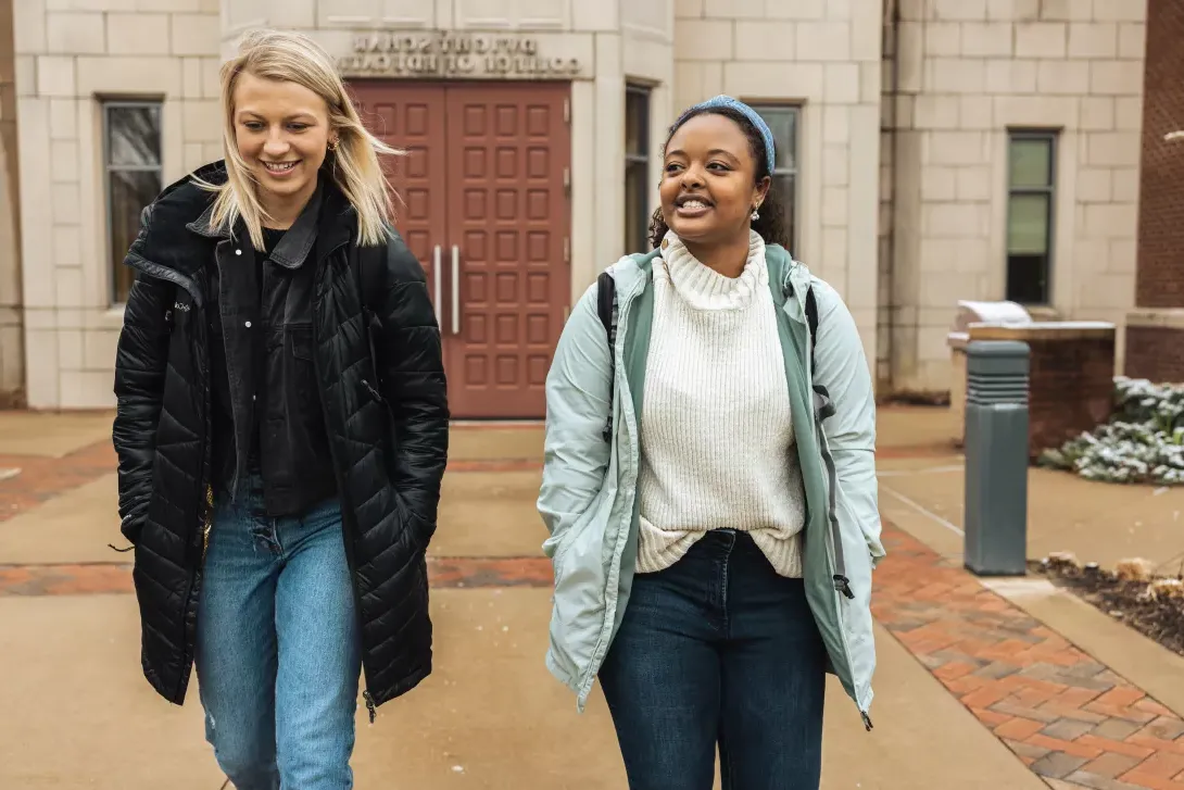 Students walking out of the College of Education